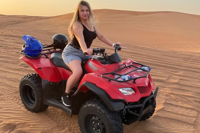 QUAD BIKE self Drive with Desert safari Full Program - Al Madam, dune bashing, and the sunset stop