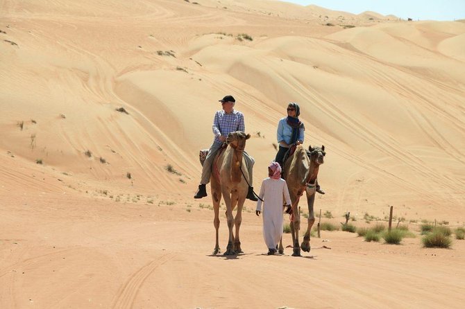 Red Dune Desert Safari with BBQ Dinner, Sand Boarding Dance Shows - Sunset photos before the camp welcome
