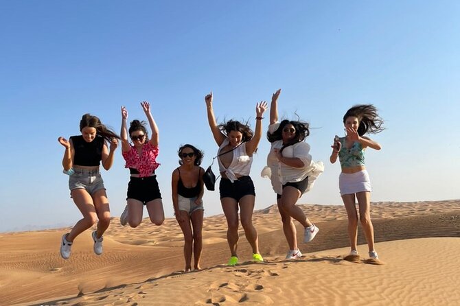 Red Dunes Desert Safari Dubai with Dinner Buffet, Show & Transfer - Hotel pickup in a shared 4x4