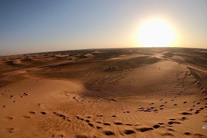 Red Dunes Desert Safari Dubai with Dinner Buffet, Show & Transfer - Sunset photos and a very short camel ride