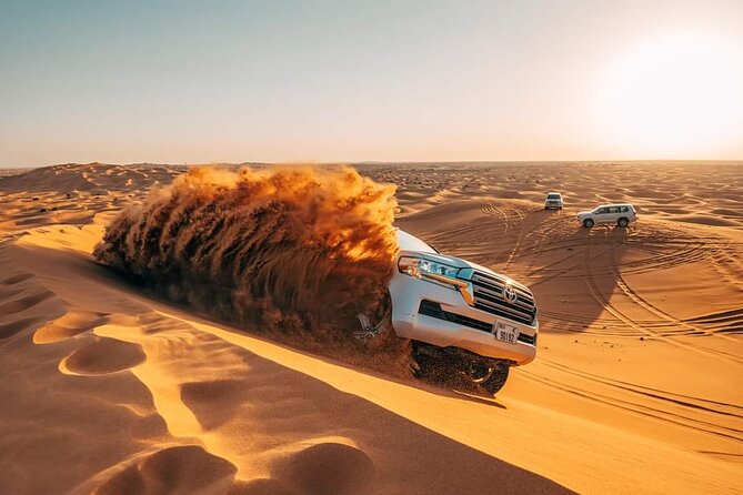 Red Dunes Desert Safari with 4x4 Pick up & Drop, Camel ride, BBQ and Live shows - At a glance