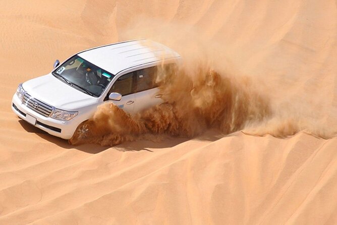 Red Dunes Desert Safari with 4x4 Pick up & Drop, Camel ride, BBQ and Live shows - Arabic coffee, dates, and the evening camp