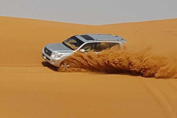 Red Dunes Desert Safari with BBQ Dinner - 4WD dune bashing on red sand