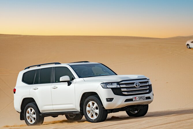 Romantic Private Dune Dinner Abu Dhabi - The Sunset Setting and Arabic Welcome