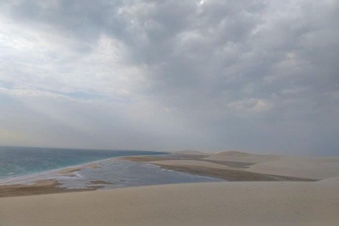 Sharing or Private Safari, Sand Boarding, Camel Ride, inland Sea Quick swim - A quick look at Khor Al Adeid