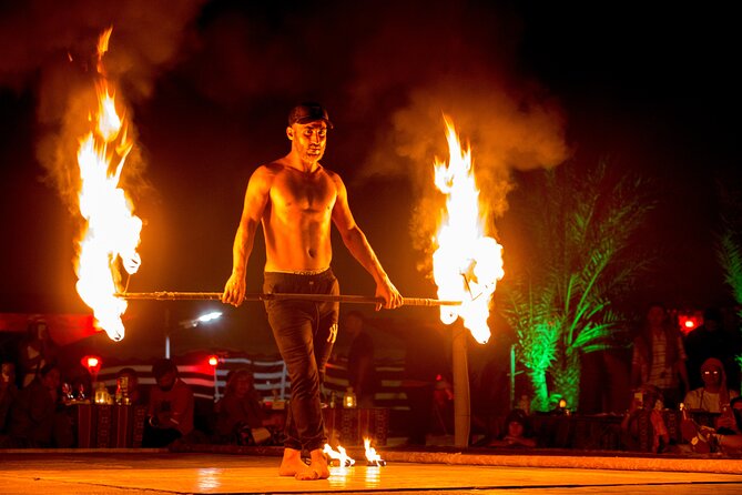 Sunset Camel Trekking with Falcon Show & VIP BBQ Dinner - The Bedouin-style camp after dark