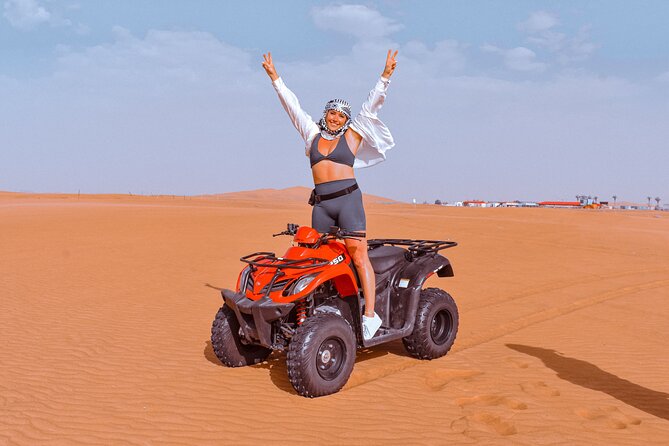 Sunset Desert Safari Quad bike Camel ride Sand Board & BBQ Dinner - A full evening from Dubai to Al Lahbab