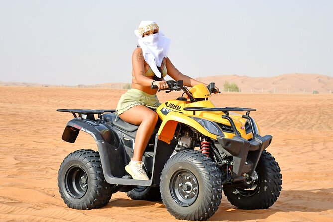 Sunset Desert Safari Quad bike Camel ride Sand Board & BBQ Dinner - Four live shows and an evening of entertainment