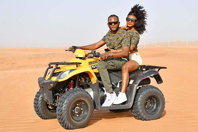 Sunset Desert Safari Quad bike Camel ride Sand Board & BBQ Dinner - Who will get the most from this safari