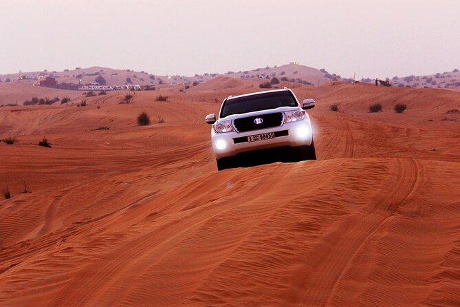 Sunset Evening Safari,Camel ride,live shows and BBQ Dinner with No Hidden Charge - Thirty-plus minutes of dune bashing and sunset views