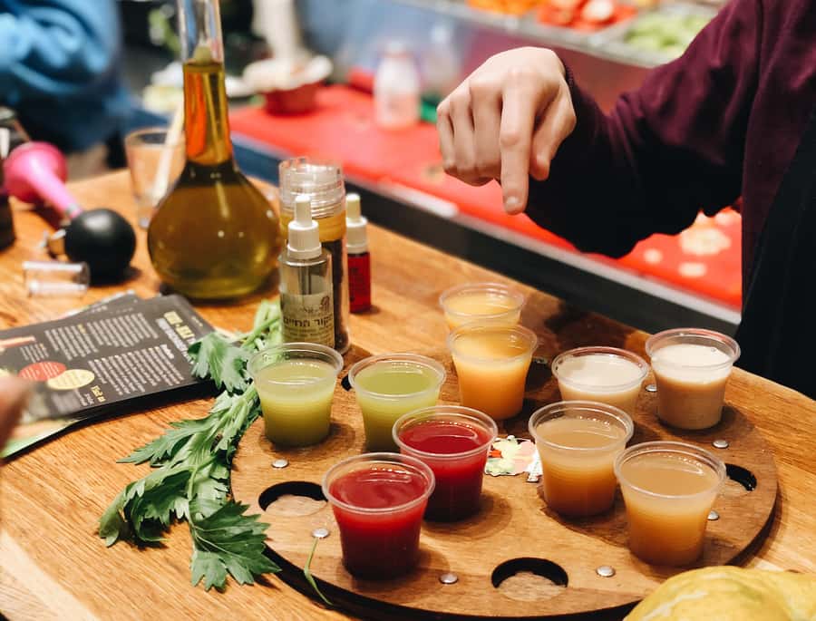 Tel Aviv: Carmel Market & Tel Aviv Tour with Tastings - Herzl Street and Rothschild Boulevard tell the city’s origin story