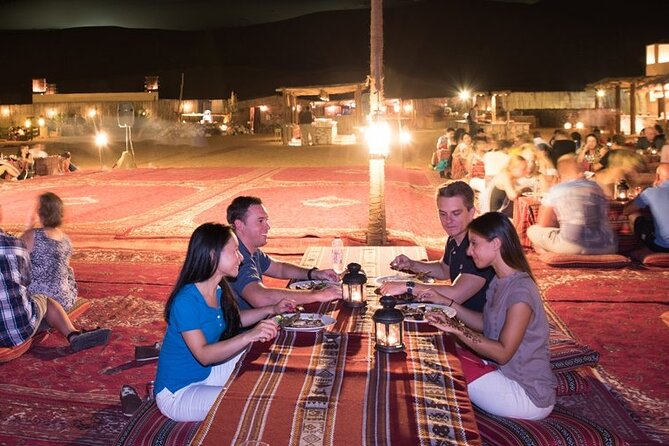 Thrilling Desert Safari Dubai Adventure with Sand Boarding and Barbecue Dinner - Sandboarding and the sunset photo stop