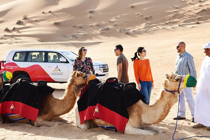 Thrilling Desert Safari Dubai Adventure with Sand Boarding and Barbecue Dinner - Camel riding, henna, and Arabic coffee