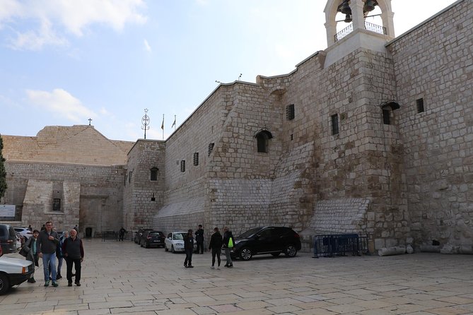 Travel To Bethlehem, Jericho & Jordan River - Group Guided Tour from Jerusalem - Milk Grotto and Bethlehem’s olive wood tradition