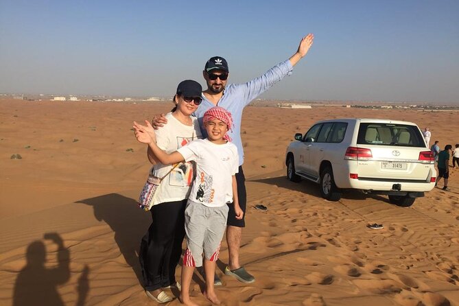 Vip Desert Safari Dubai with Camel Riding BBQ Dinner & Live Shows - A short camel ride and sandboarding at camp