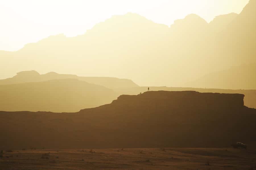 Wadi Rum: Explore 10-Hour Jeep Tour Pass, Guide, Meal & Stay - Sandboarding on the dunes