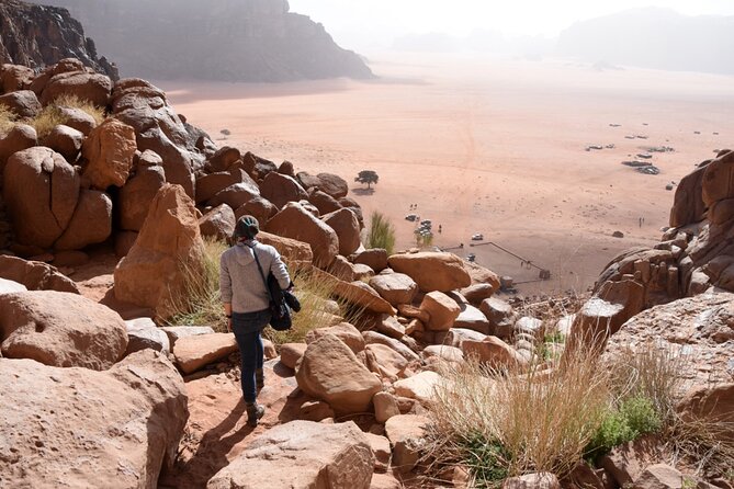 Wadi Rum: Explorer Jeep Tour PASS + Local Food + Optional Stay - Khazali Canyon and the oldest marks on the rock
