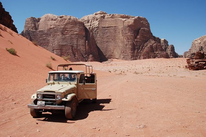 Wadi Rum Jeep Tour & Camp; Overnight - Red dunes, sandboarding, and Jebel Khazali