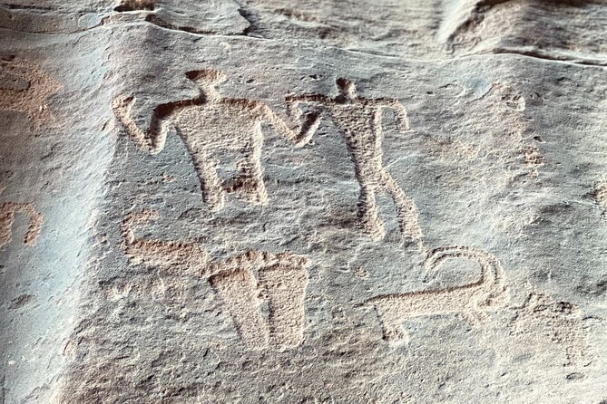 Wadi Rum Short Tours - Khazali Canyon combines scenery with ancient markings