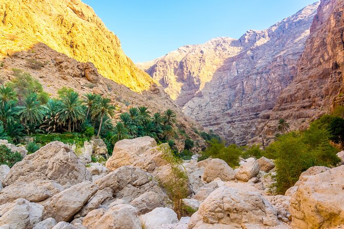 Wadi Shab and Bimmah Sinkhole Group Full Day Tour - What the Muscat pickup and drive are like